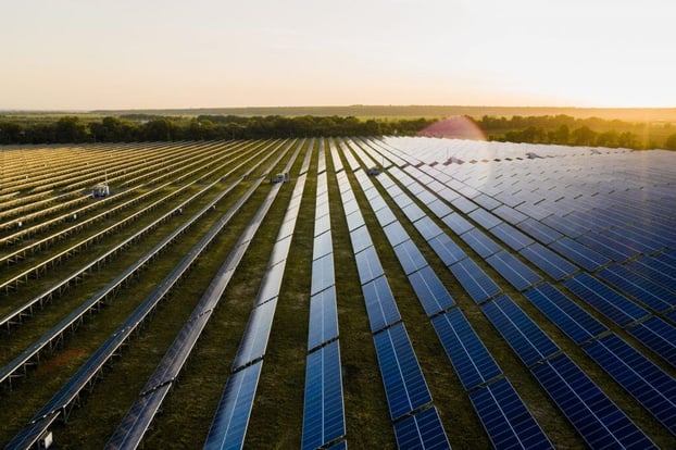 aerial-top-view-of-a-solar-panels-power-plant-9FHPNUS-1024x682