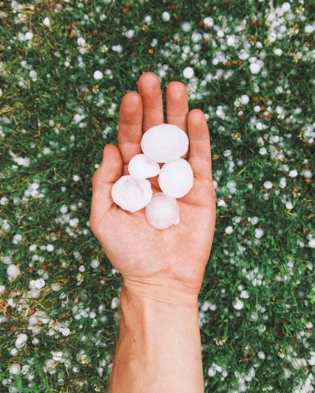 large-hailstones-in-hand-2021-09-25-02-43-06-utc-820x1024