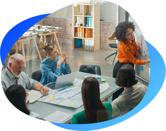 Group of employees having a meeting at Power Factors